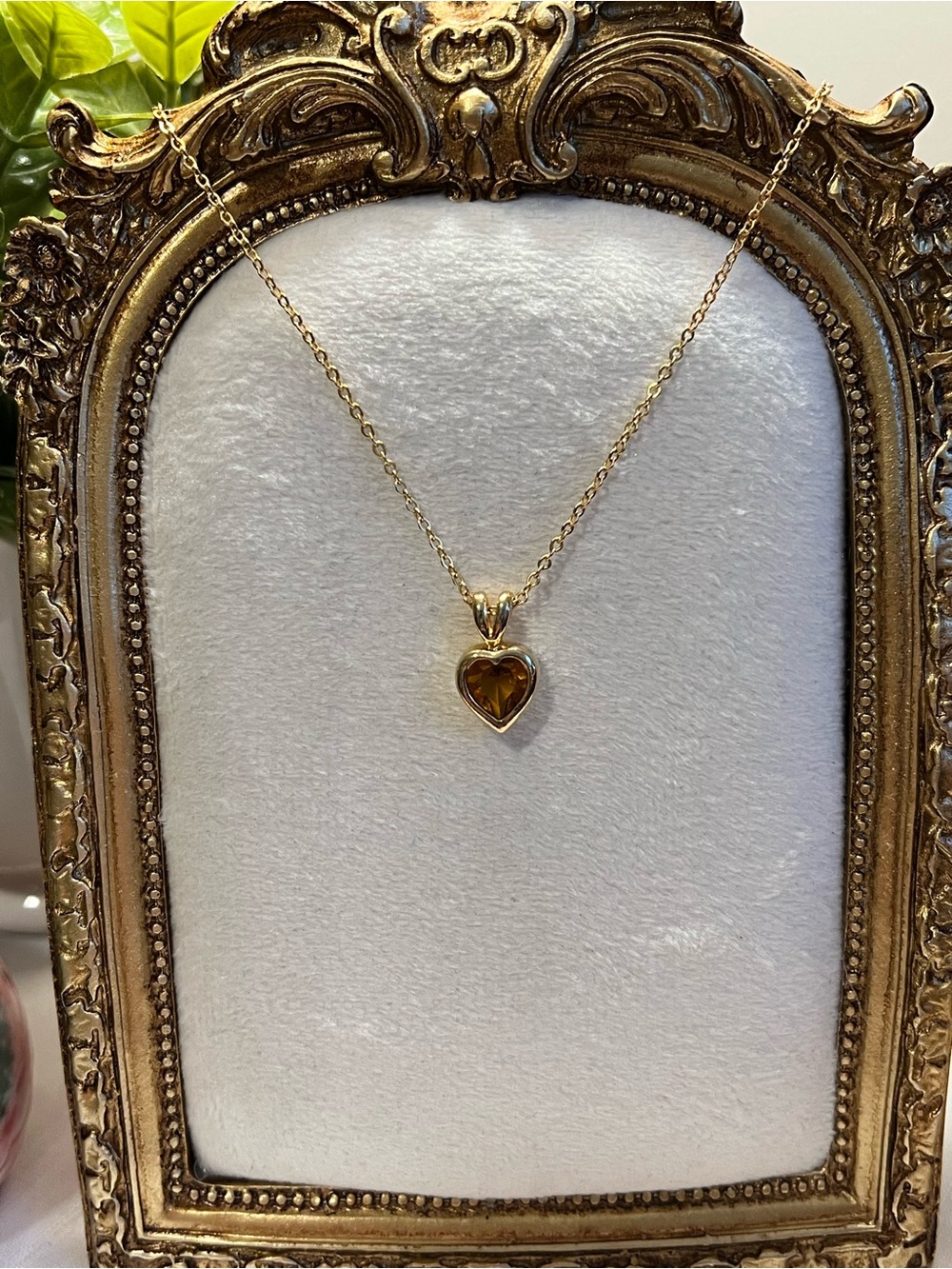 Gold Heart Pendant Necklace with Amber-Colored Stone